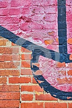 Texture of red bricks with black and red paint