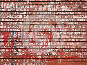 Texture of a red and dirty brick wall