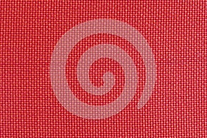 Texture of red fabric, roughly woven, background