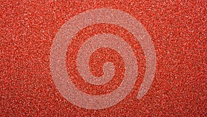 Texture of red sandpaper.