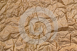 Texture of rough, brown, crumpled paper, closeup