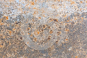 Texture of rust stains on the surface of a metal sheet
