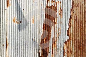 Texture and rusty zinc house fence background