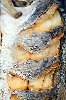 Texture of seabass or lates fish deep fried. photo