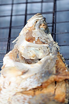 Texture of seabass or lates fish deep fried. photo