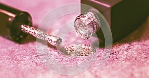 Texture of shiny nail polish shine closeup.a bottle of nail polish next to the brush. The concept of cosmetic