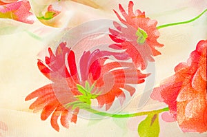 texture of silk fabric. background. Beige with red flowers