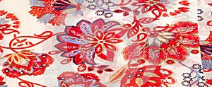The texture of the silk fabric, red flowers on a white backgroun