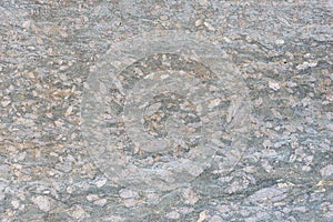 The texture of the slab of natural gray stone, background.