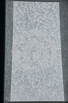 Texture of snow over skylight window viewed from the inside a house