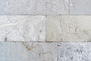 Texture of a stone block wall close-up