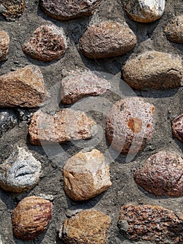 The texture of a stone wall made of large stone.