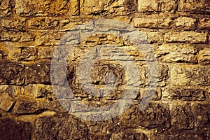 Texture of a stone wall. Old castle stone wall texture background