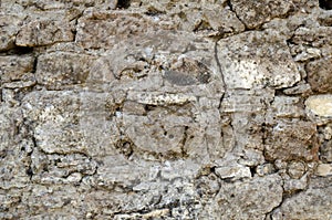 The texture of the stone wall. Old castle stone wall texture background. Stone wall as a background or texture. Part of a stone