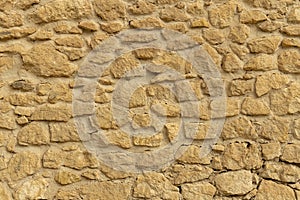 Texture of a stone wall. Old castle stone wall texture background. Stone wall as a background or texture. Part of a stone wall,