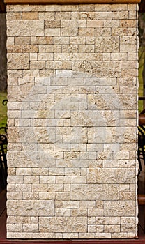 Texture of stone wall, square yellow travertine tile