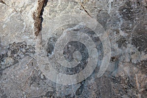 Texture of stone walls with cracks for the background.