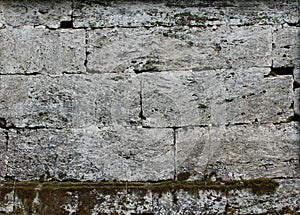The texture of the stones in blank wall.