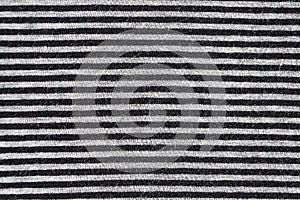 texture of striped monochrome knitted fabric close-up