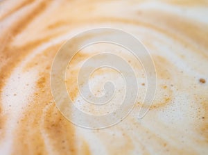 Texture surface of soft and delicate milk froth in a cup of coffee