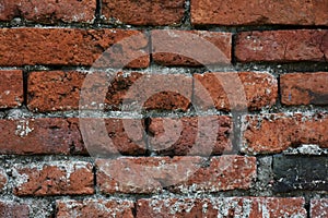 Texture and texture of old wall made of red bricks  for the background