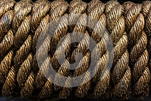 Texture of tightly wound rope close-up. Low key.