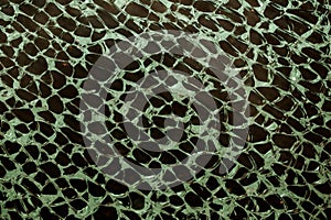 Texture of transparent green broken glass