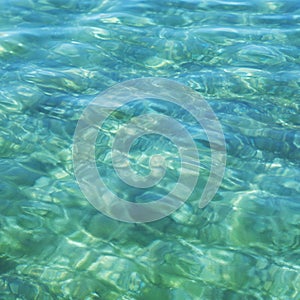 Texture of turquoise calm sea surface