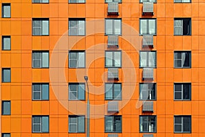 Texture unusual abstract orange house with windows