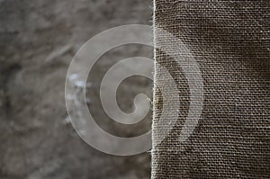 The texture of a very old brown sack cloth. Retro texture with canvas material. Background image with copy space