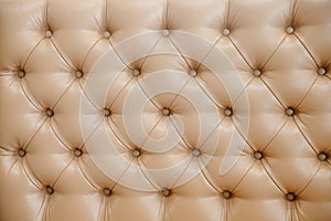 Texture of vintage padding cushion beige shade, sofa upholstery