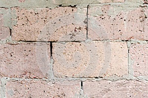 Texture of a wall from a big red brick