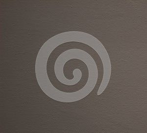 Texture of a wall with a grey droplet