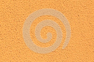Texture of a wall orange. Background porous