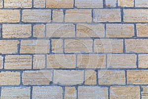 The texture of the wall of stone bricks