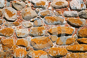 The texture of the walls of ancient fortress tower
