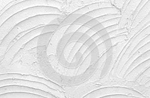 Texture of white color cement or plaster for background and design art work, grunge concrete wall pattern