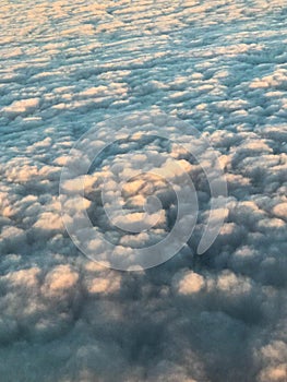 Texture of white fluffy airy rain luminous gentle natural celestial clouds and blue sky. The background