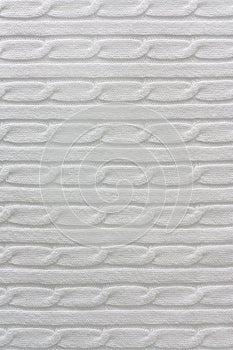 Texture of white knitted cotton fabric for background