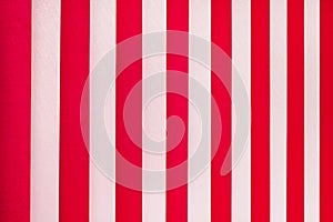 Texture of white and red stripes. Vertical blinds on window_