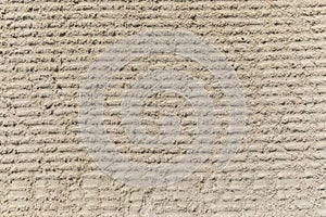 Texture of white sand on the beach