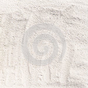 Texture of white sand beach for a background