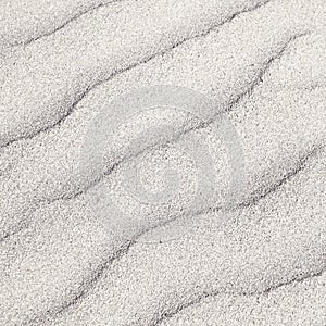 Texture of white sand beach for background
