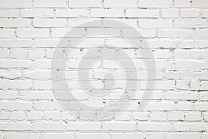 Texture of white wall made of old bricks. Surface background with copy space