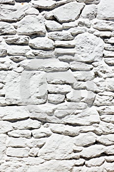 Texture of whitewashed stone masonry