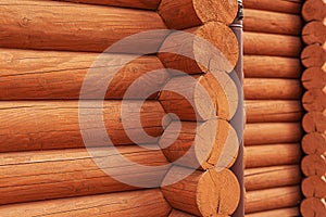 Texture of a wooden blockhouse made of logs.