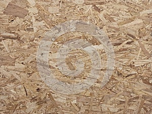 Texture of wooden material. Board of compressed sawdust