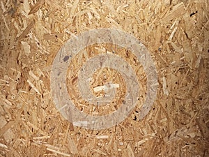 Texture of wooden material. Board of compressed sawdust