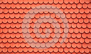 Texture of wooden tiles painted typically Swedish with falu red photo