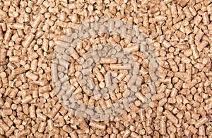 Texture of woody clumps, pellets of litter, for cat, rabbit, guinea pig, hamster, rodent, bird